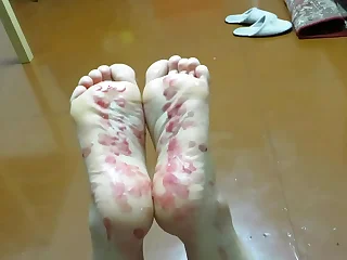 Easy domination with tickling and wax on bare feet Homemade foot fetish of a mature couple